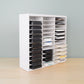 ink pad organizer full of pads that is white and square designed to fit in kallax shelving