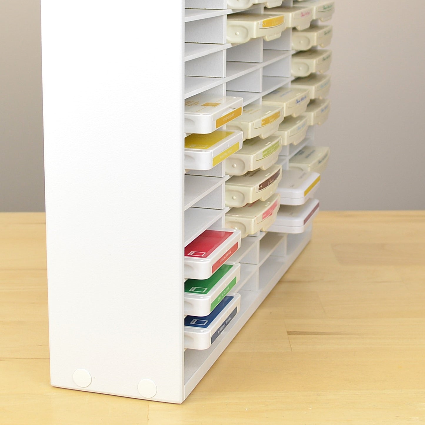 Side view of ink pads in a storage rack made by OrganizeMore.