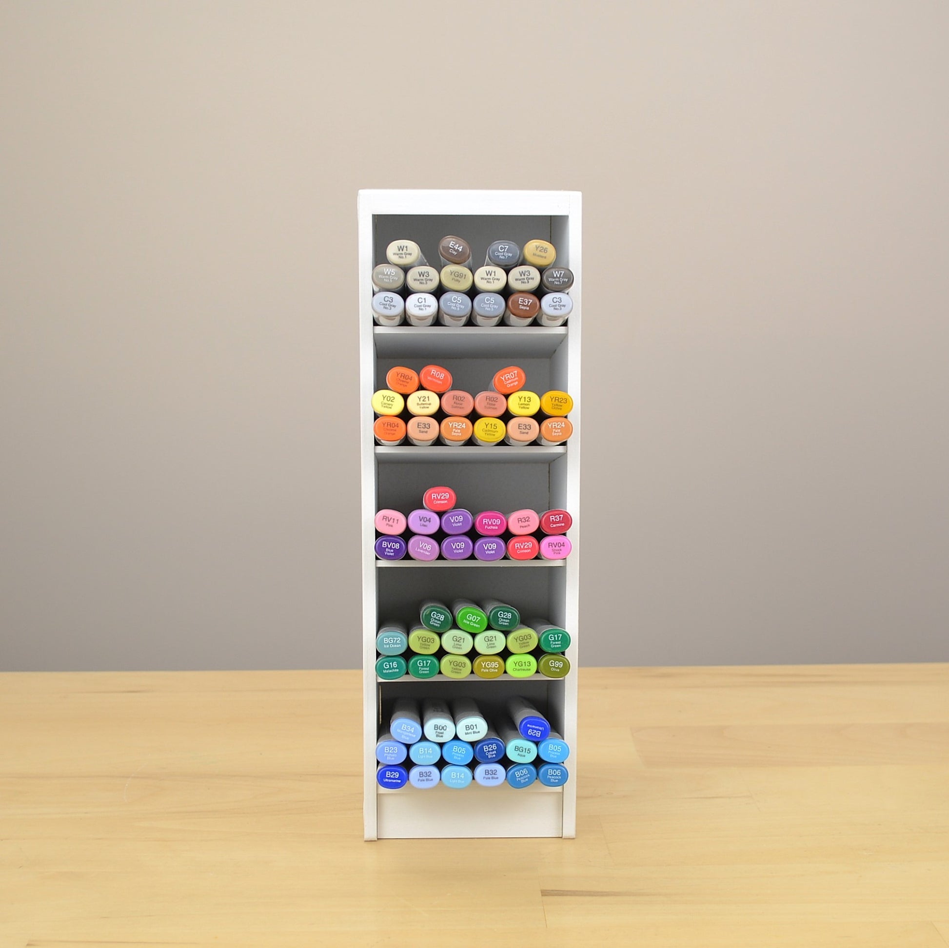 Copic markers in a cute marker organizer that holds 120. 