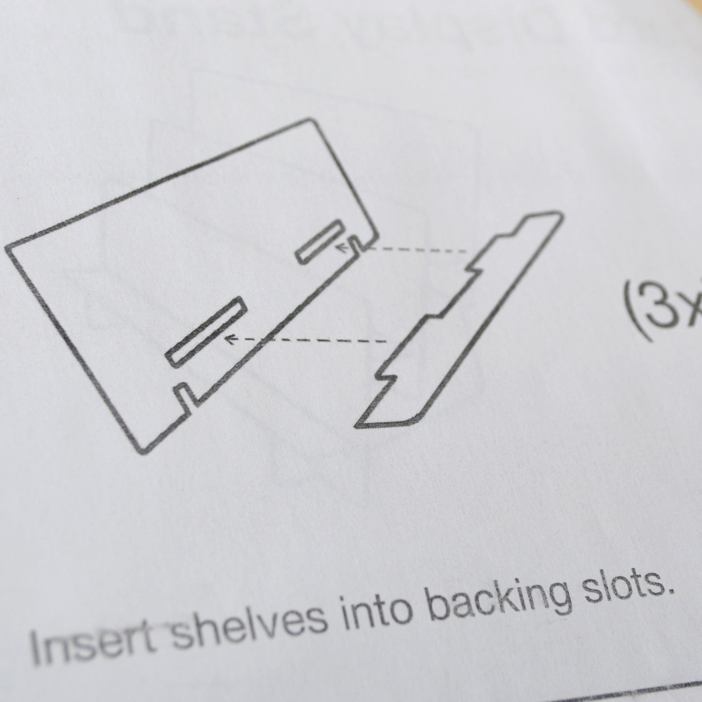 sample view of the assembly instructions included with a tiered shelf for displaying handmade cards