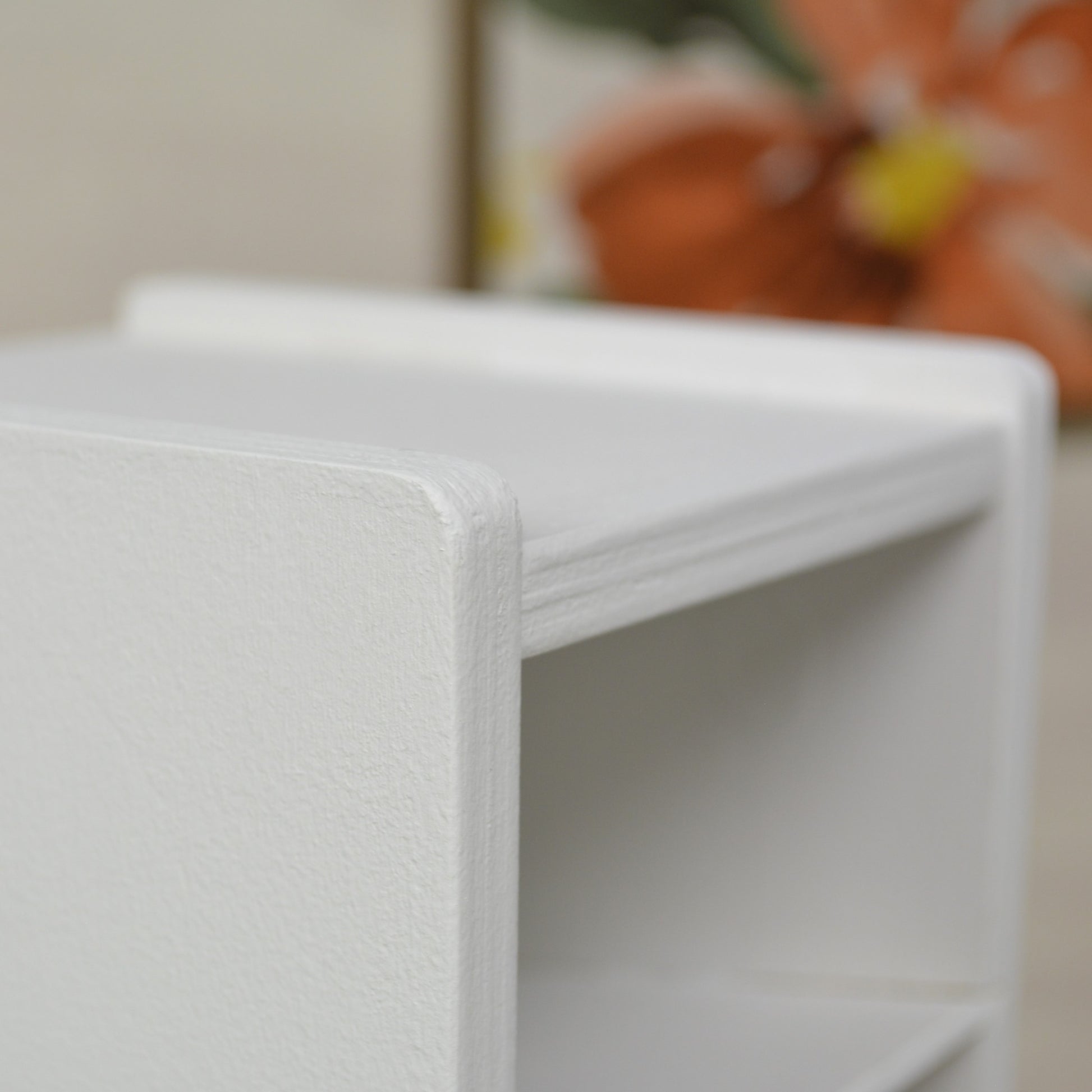 white marker organizer closeup of the cabinet's rounded corners