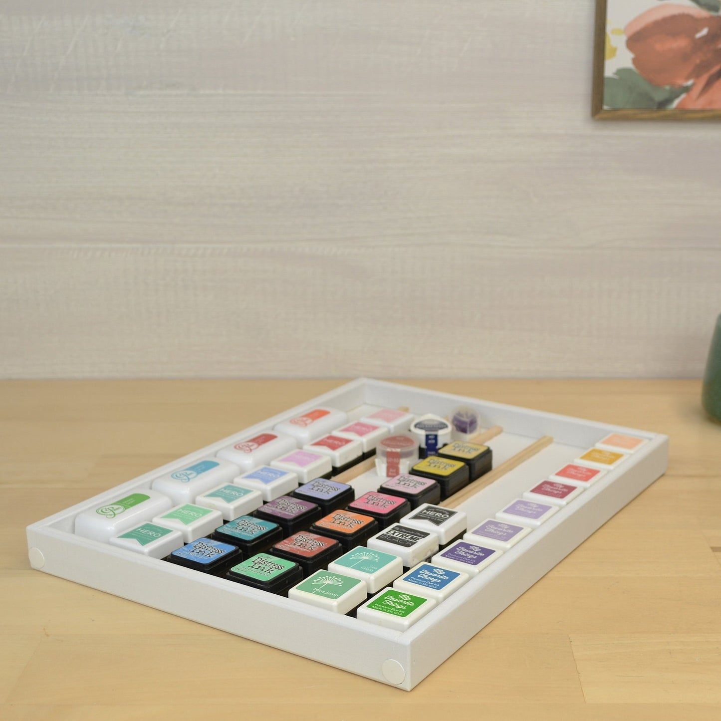 a white mini ink tray full of colorful ink cubes