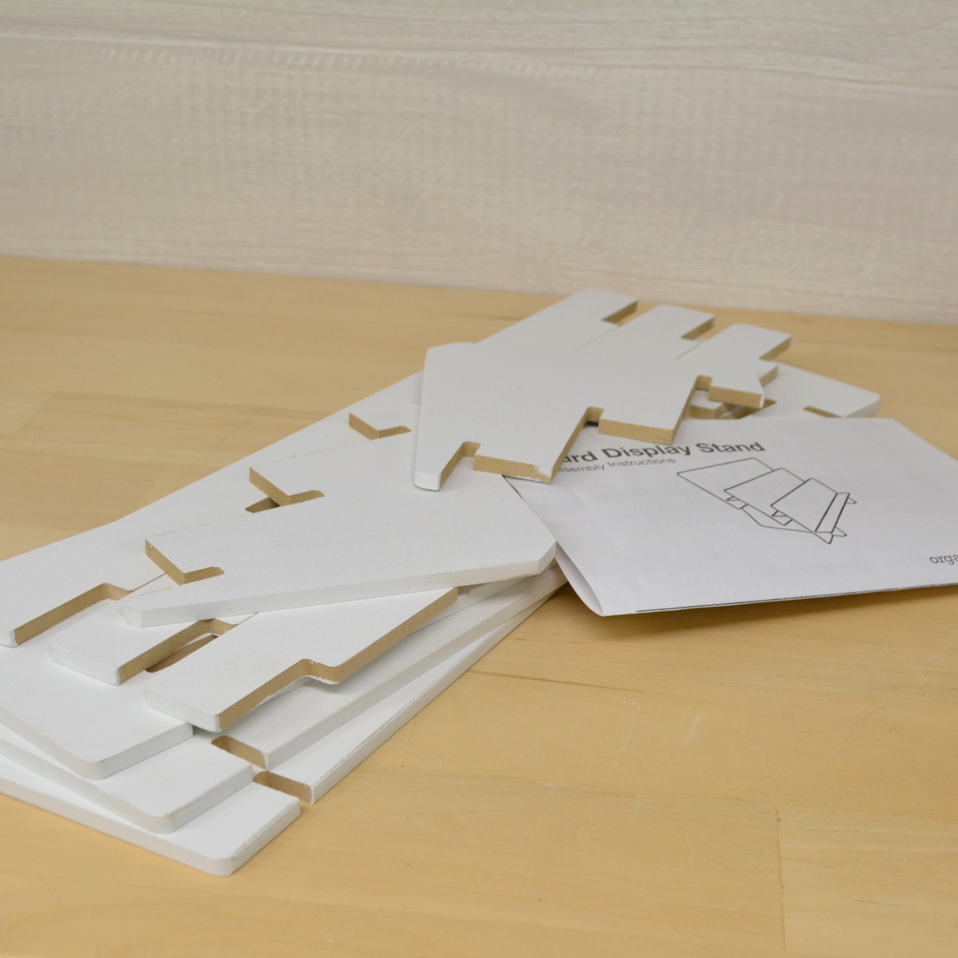 view of disassembled  greeting card stand