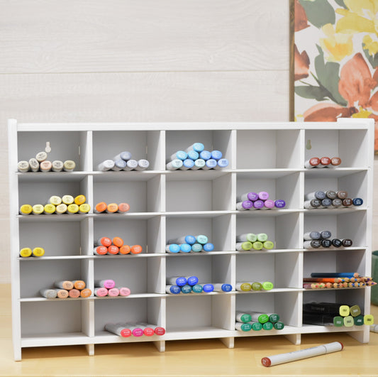 huge marker organizer that has twenty five cubbies and holds 600 copic markers