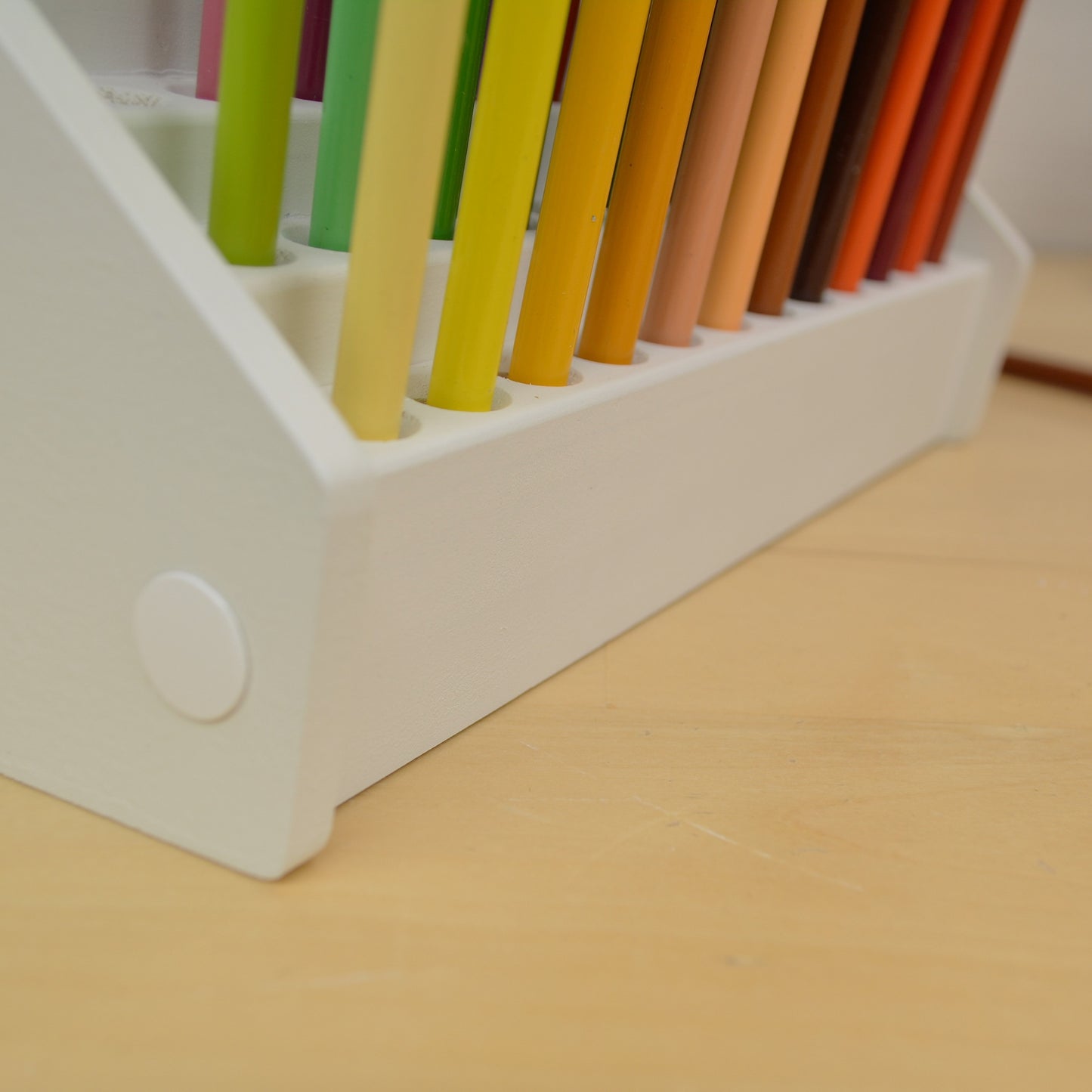 closeup view of drawing pencils in a desktop holder